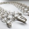 A three link, 1mm gauge full-length waist metal cilice with metal fastener - Image 3